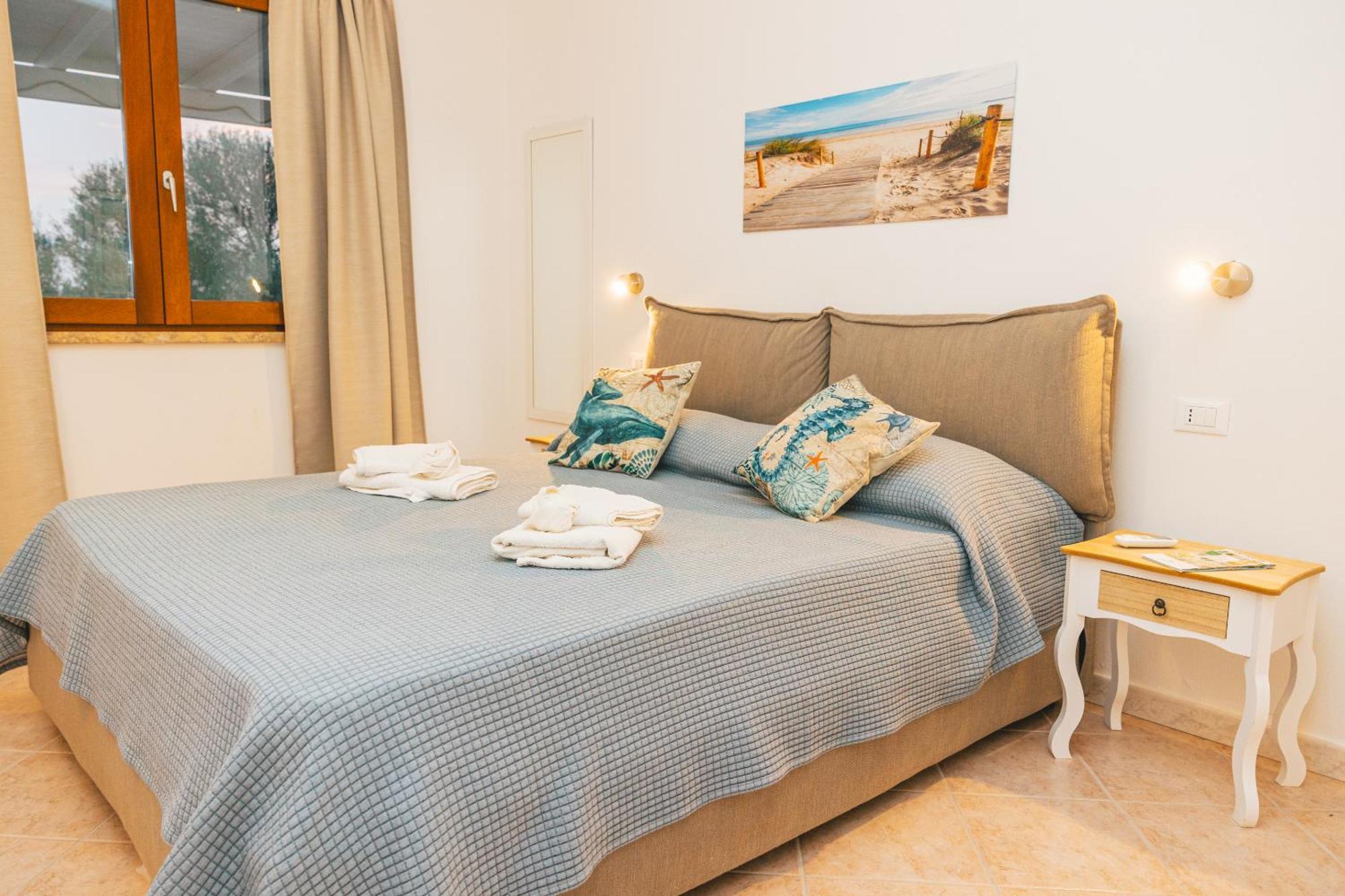 Case Vacanze Il Sogno 2 Porto Pino Rum bild